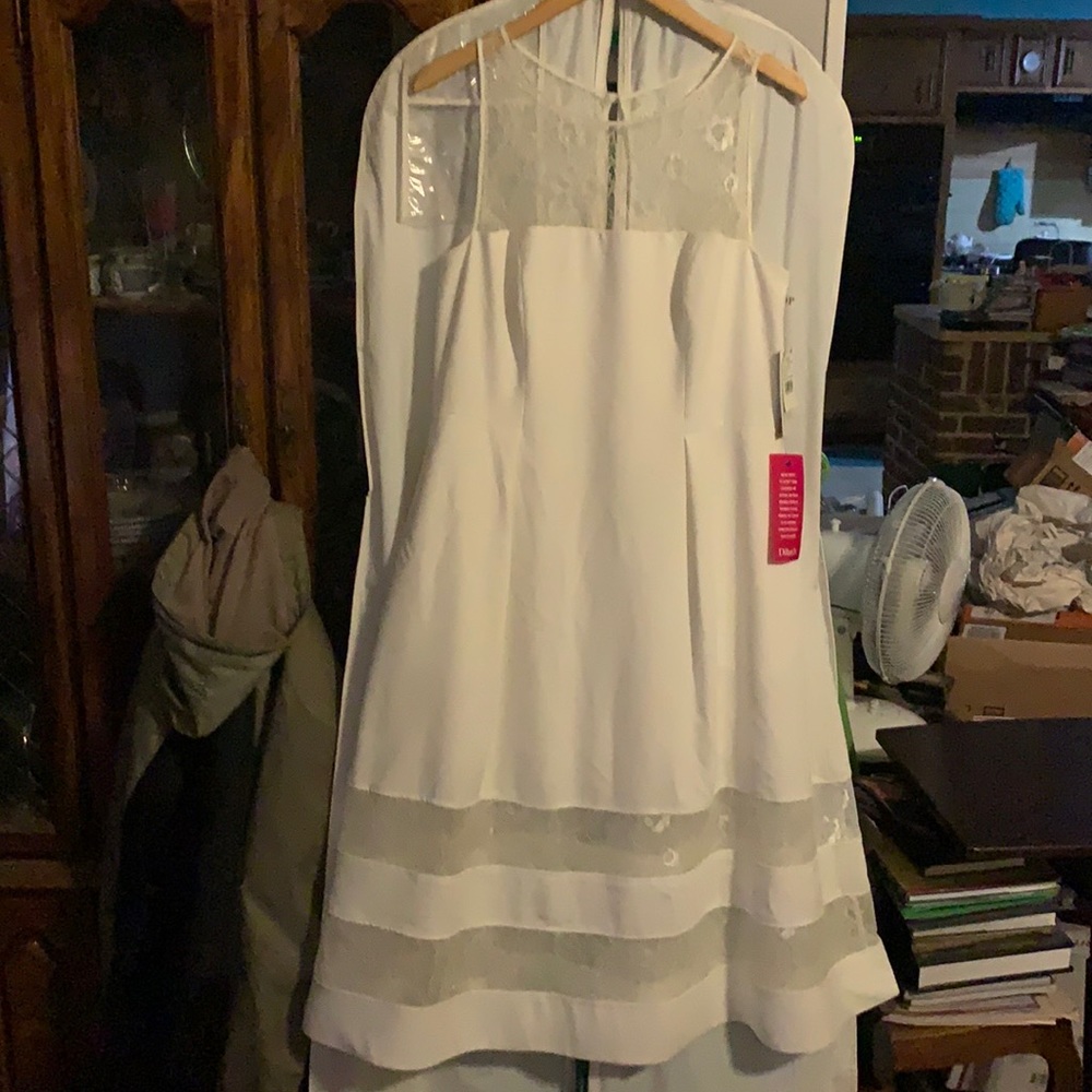 Bought as a casual wedding dress, never worn